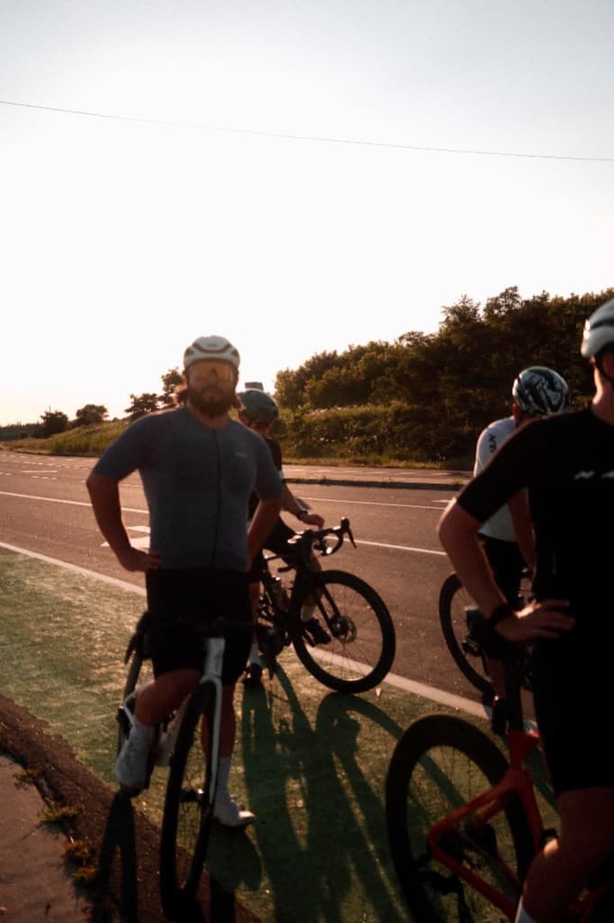 A small group regrouping at the side of the road
